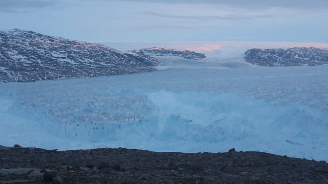 Watch as a six-kilometre iceberg breaks away from glacier