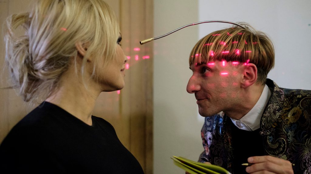 Harbisson is mapping Pamela Andersons face using his antenna