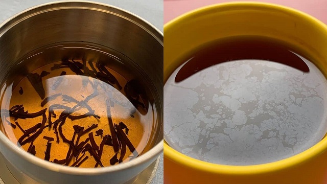 What causes the oily film on black tea?